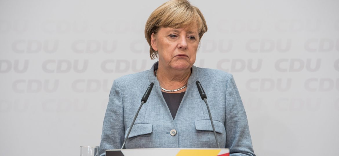 Free image/jpeg Resolution: 6016x4016, File size: 4.19Mb, Sad Angela Merkel at microphones
